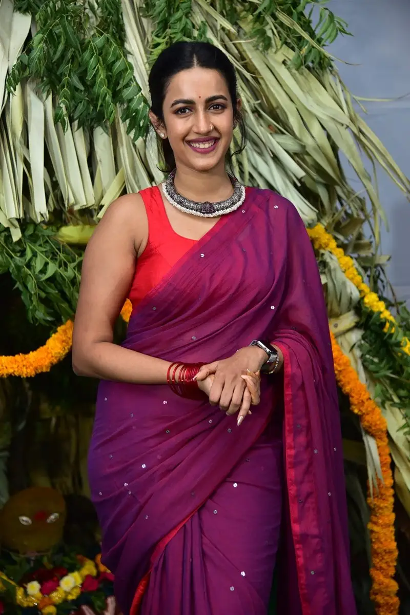 Niharika Konidela Stills in Violet Saree Sleeveless Orange Blouse